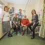 Portrait photograph of 5 people in a doctor surgery