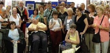 Photo of a large group of the organisations staff and volunteers