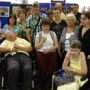 Photo of a large group of the organisations staff and volunteers