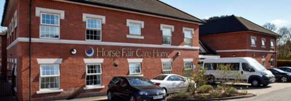A photograph showing the front of Horse Fair care home building